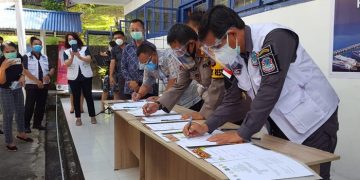 Walikota Manado dan pihak yudikatif menandatangani perjanjian kerjasama penggunaan fasilitas untuk rumah singgah bagi tahanan dan narapidana. (foto: Humas Pemkot Manado)
