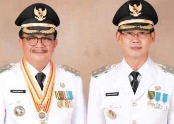 Maurits Mantiri dan Hengky Honandar