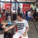Pedagang di wilayah Pasar Ulu saat menerima vaksin yang dipusatkan di Terminal Ulu.(Foto:Stenly/Barta1)