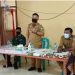 Camat Manganitu Julian Pesik saat menyampaikan sosialisasi Prokes Covid-19 kepada masyarakat. (Istimewa)
