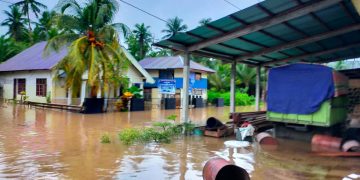 Foto : Rendaman Banjir di Kampung Laine Kecamatan Manganitu Selatan, Minggu 16/1/2022 (Foto: Istimewa)