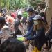 Foto : Aksi bersih-bersih sampah di pasar ikan Manganitu (Dok. Istimewa)