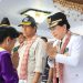Prosesi adat penyambutan Penjabat Bupati Kepulauan Sangihe, dr. Rinny Tamuntuan. (Istimewa)