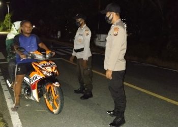 Patroli malam oleh petugas Kepolisian