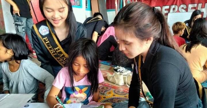 Putra-Putri FEB Unsrat Berbagi Kasih Kepada Anak-anak Dinding Manado