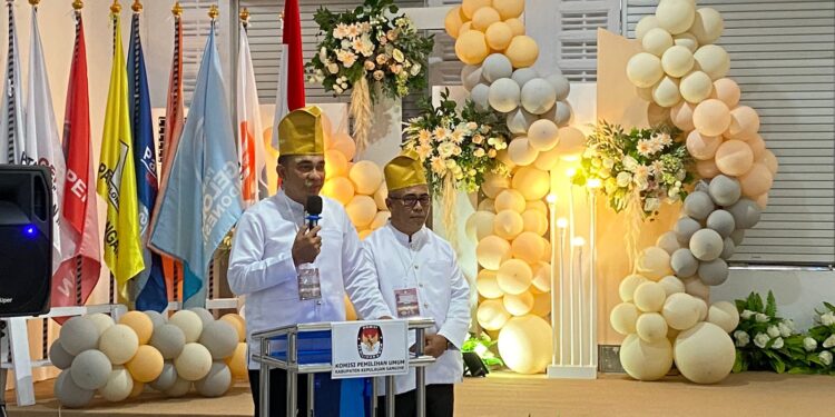 foto: Pasangan bakal calon Bupati dan Wakil Bupati Kabupaten Kepulauan Sangihe, Hendrik Manossoh dan Remran Sinadia. (Dok. Rendy/barta1),