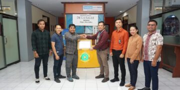 Komunitas Dinding bersama Pimpinan Unika De La Salle Manado. (Foto: istimewa)