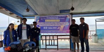 Tim PPM Polimdo bersama sekretaris Desa Budo, Lisbeth Lintogareng. (Foto: istimewa)