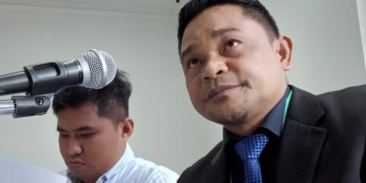 Sunarto Bataria, S.H dan Rifky Dwi Putra Ambuliling, S.H., M.H.