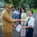 Pj Bupati Sangihe Albert Wounde Serahkan Kendaraan Operasional dan Apresiasi Lomba Inovasi Daerah 2024