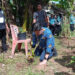 Foto: Bupati Kepulauan Sangihe, Michael Thungari mengambil bagian dalam penanaman pohon di Kampung Kuma. (Dok. Rendy/Barta1)
