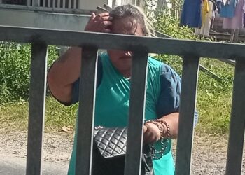 Sosok perempuan paruh baya yang mengaku anggota BIN.