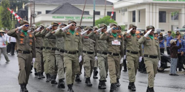 Hujan Tak Surutkan Semangat, Lomba Gerak Jalan Antar OPD Kotamobagu Meriah