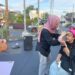 Demo makeup pada aksi API Sulut. (foto: meikel/barta)