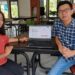 Tim BIMA Polimdo menyerahkan bantuan kepada pihak Perikanan dan Usaha Wanita Lyvia Nusa Boga. (foto: istimewa)
