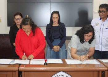 Penandatanganan MoU Polimdo dan SMK N 1 Manado. (foto: istimewa)