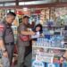 Razia Kios, SatPol-PP Kotamobagu Sita Puluhan Botol Miras dan Cap Tikus