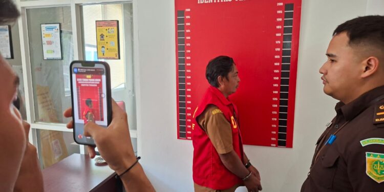 Foto: Mantan PLH Kapitalaung Kampung Beha Resmi Ditetapkan Tersangka. (Dok. Istimewa)