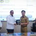 Bupati Kepulauan Sangihe, Michael Thungari meneken kerjasama pengembangan SDM dengan Universitas Negeri Manado. (Dok. Istimewa)