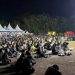 Keramaian massa dalam nobar Piala Dunia 2026 di Kota Palu Sulteng. (foto: Humas PLN)