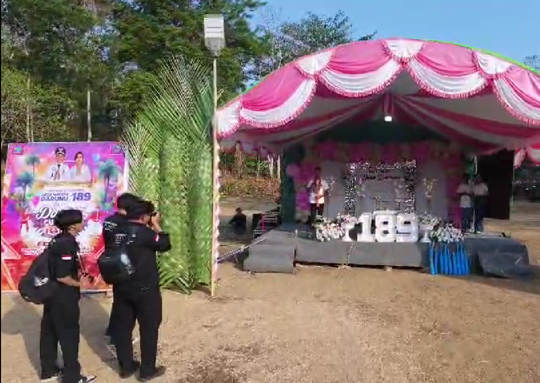 Momen Tim Pengabdian Polimdo di Semarak HUT Desa Darunu. (foto : istimewa)