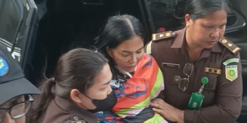 VAP dikawal tim tangkap buron Kejati Sulut. (foto: Tribunmanado)